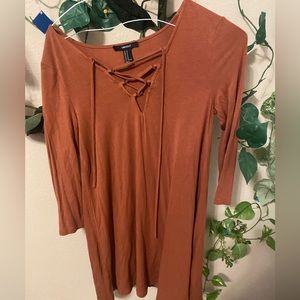 Warm brown, dress. Ties in the front